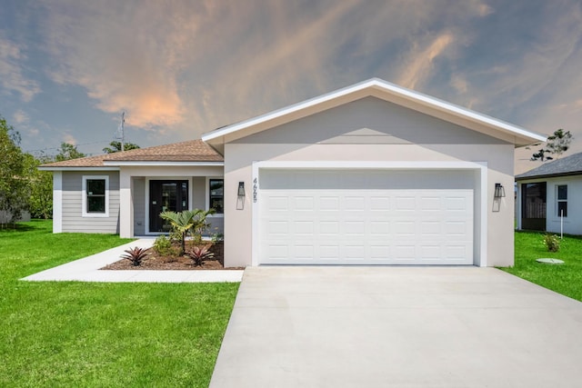 4665 SW Keats St, Port Saint Lucie, FL 34953 - ranch-style home featuring concrete driveway, a front lawn, a garage, and stucco siding