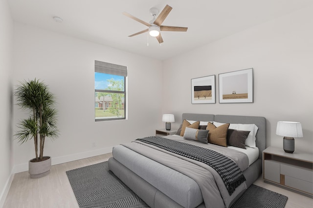 4665 SW Keats St, Port Saint Lucie, FL 34953 - bedroom with light wood-style floors and a ceiling fan