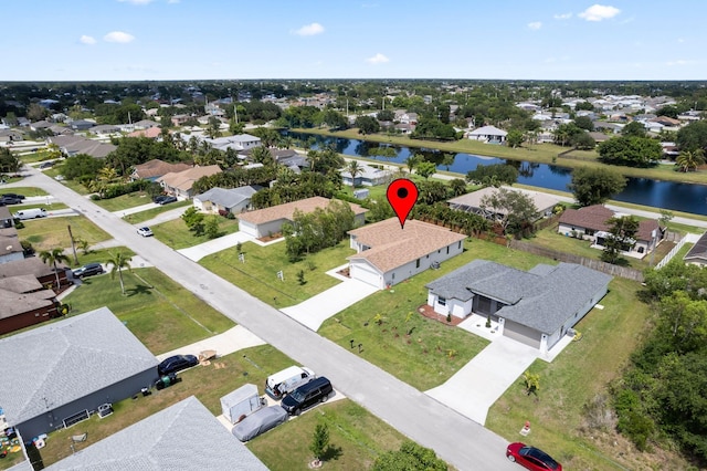 4665 SW Keats St, Port Saint Lucie, FL 34953 - aerial view of residential area featuring a nearby body of water
