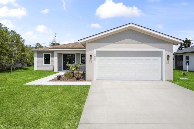 4665 SW Keats St, Port Saint Lucie, FL 34953 - single story home with concrete driveway, a front lawn, stucco siding, and an attached garage
