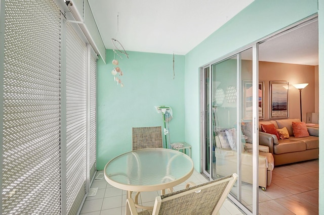 balcony featuring outdoor dining space