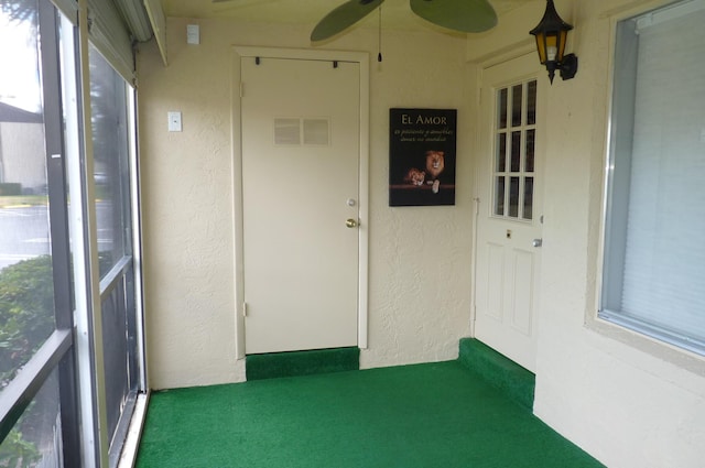 unfurnished sunroom with visible vents
