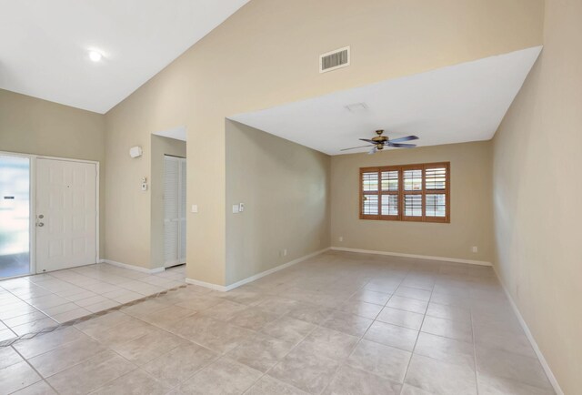 8449 Springlake Dr, Boca Raton, FL 33496 - kitchen featuring decorative backsplash, appliances with stainless steel finishes, a sink, light tile patterned floors, and a chandelier