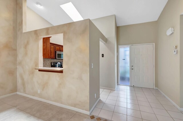 8449 Springlake Dr, Boca Raton, FL 33496 - foyer with baseboards and ceiling fan