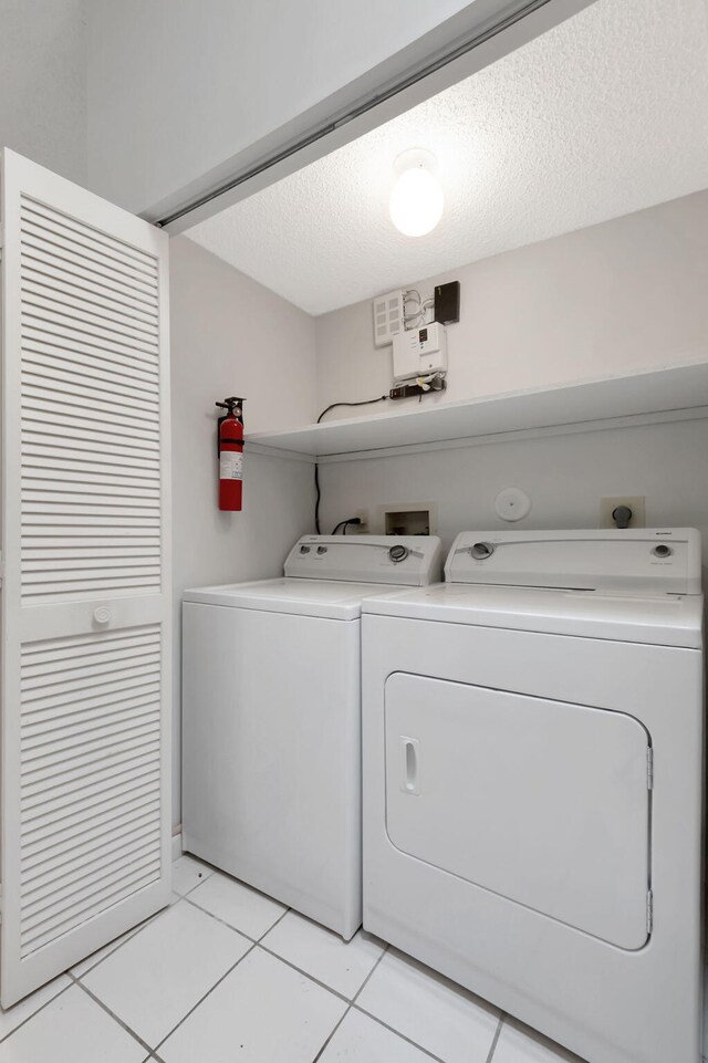 8449 Springlake Dr, Boca Raton, FL 33496 - bathroom featuring tile patterned floors and a stall shower