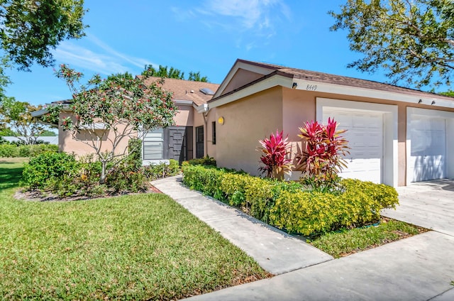 8449 Springlake Dr, Boca Raton, FL 33496 - ranch-style house with a garage, stucco siding, driveway, and a front yard