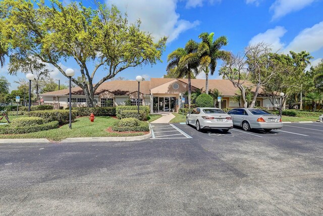 8449 Springlake Dr, Boca Raton, FL 33496 - view of swimming pool featuring fence