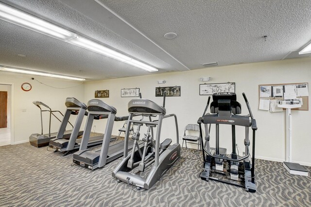 8449 Springlake Dr, Boca Raton, FL 33496 - gym featuring carpet floors, a textured ceiling, visible vents, and baseboards