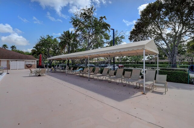 8449 Springlake Dr, Boca Raton, FL 33496 - view of home's community featuring a gazebo, covered parking, and fence