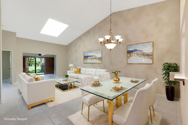 8449 Springlake Dr, Boca Raton, FL 33496 - unfurnished room with a skylight, baseboards, high vaulted ceiling, a chandelier, and light tile patterned flooring