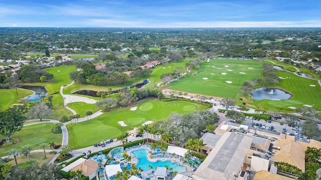 birds eye view of property featuring a water view and golf course view