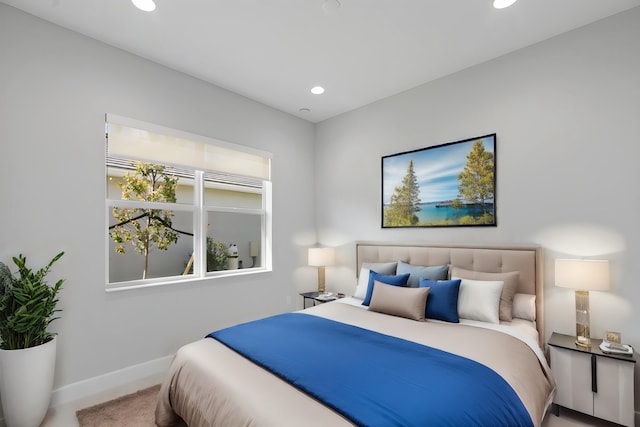 bedroom with recessed lighting and baseboards