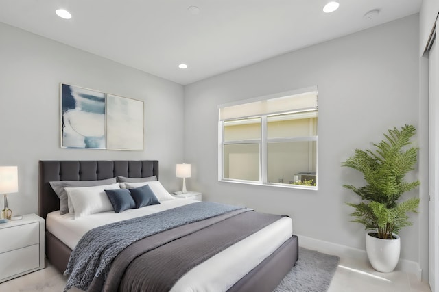 bedroom with baseboards and recessed lighting