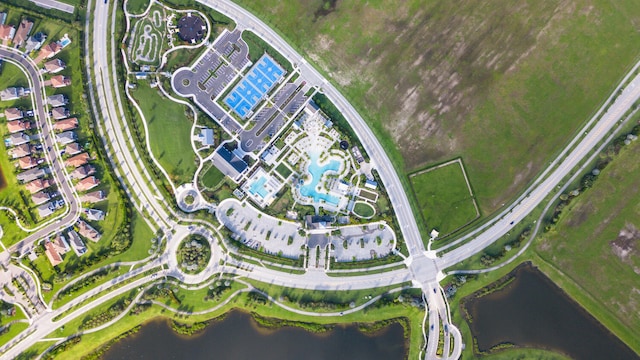 bird's eye view with a water view