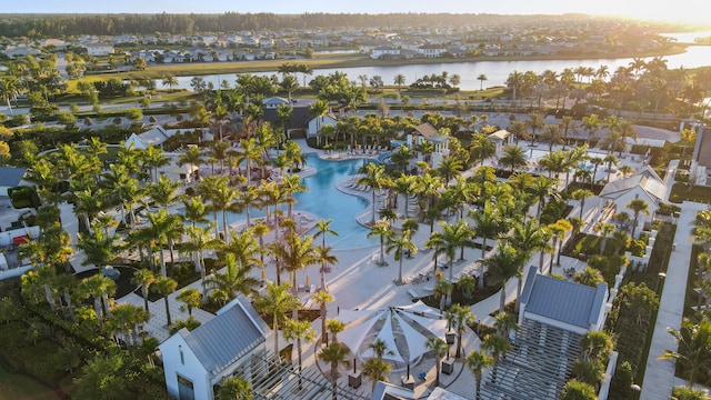 bird's eye view featuring a water view and a residential view