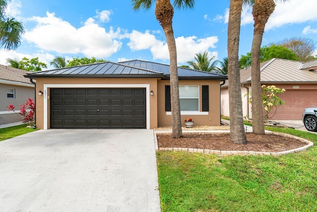 single story home with a standing seam roof, driveway, metal roof, an attached garage, and stucco siding