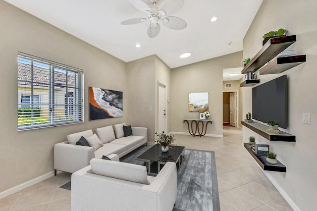 living area featuring a ceiling fan, visible vents, baseboards, recessed lighting, and light tile patterned flooring