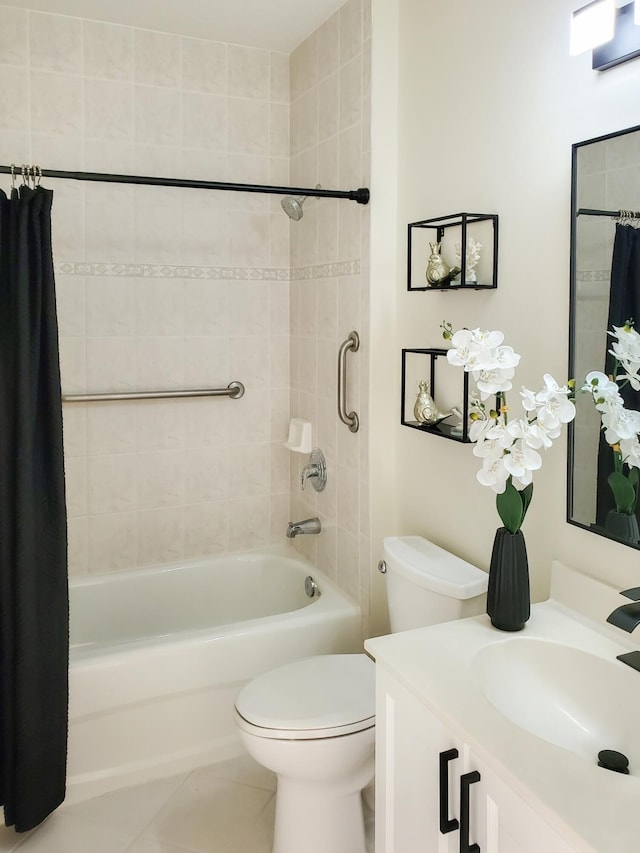 full bath featuring toilet, tile patterned floors, shower / bath combination with curtain, and vanity