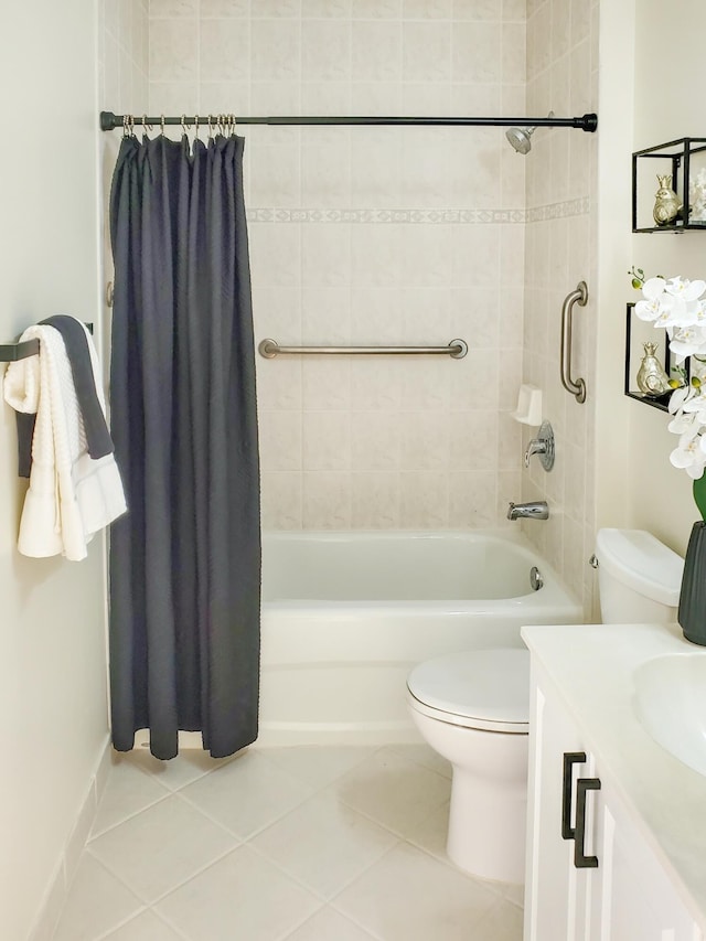 full bath with vanity, tile patterned floors, toilet, and shower / bathtub combination with curtain