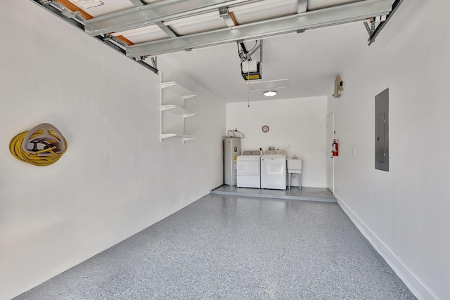 garage featuring a garage door opener, electric panel, washer and dryer, and electric water heater