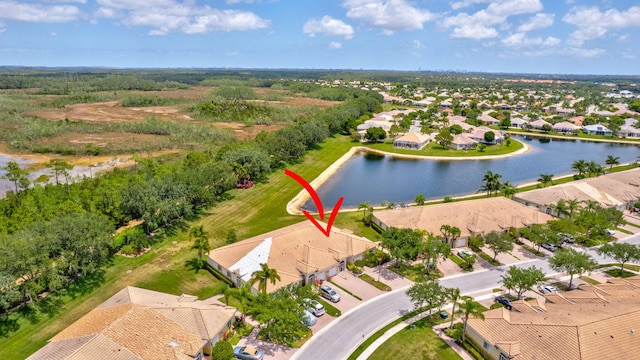 aerial view with a water view and a residential view