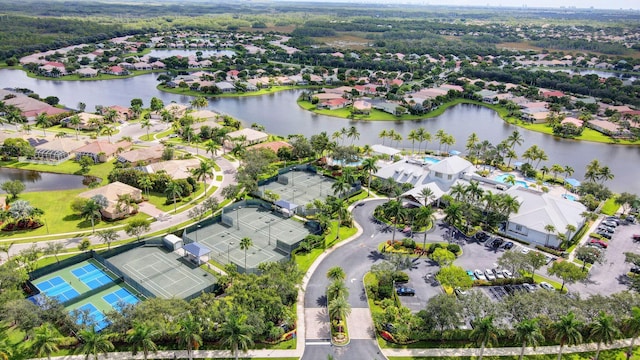 bird's eye view featuring a water view and a residential view