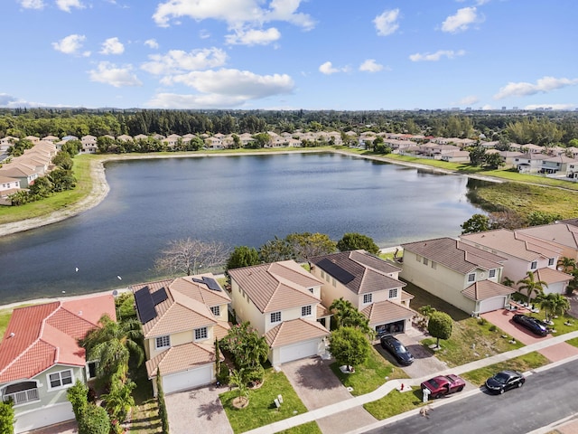 aerial view with a residential view and a water view