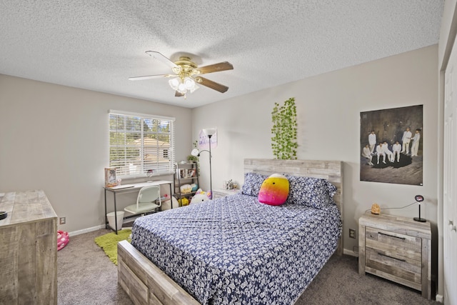 carpeted bedroom with baseboards, a ceiling fan, and a textured ceiling