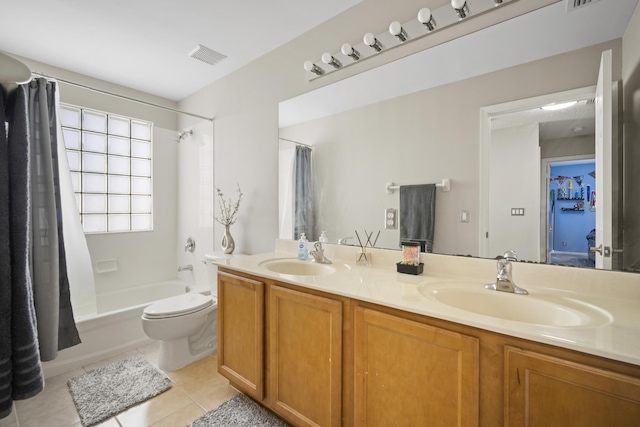 bathroom with visible vents, double vanity, tile patterned floors, a sink, and shower / bath combo