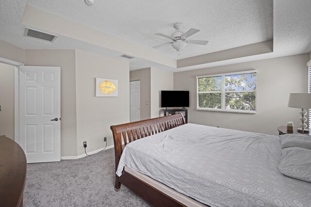 6427 Adriatic Way, Greenacres, FL 33413 - bedroom with a textured ceiling, carpet flooring, baseboards, and a ceiling fan