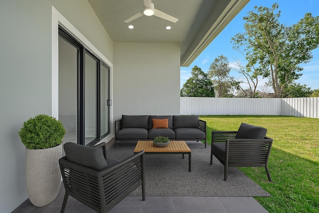view of patio / terrace with a ceiling fan, outdoor lounge area, and fence