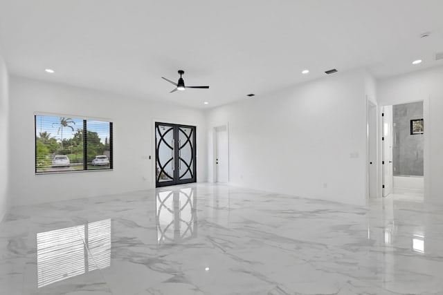 unfurnished room featuring recessed lighting, ceiling fan, visible vents, and marble finish floor