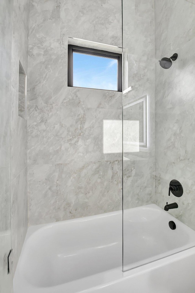 full bath featuring washtub / shower combination