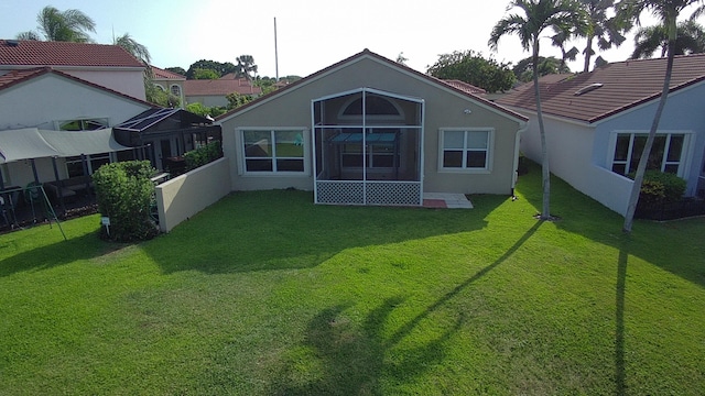 12362 Pleasant Green Way, Boynton Beach, FL 33437 - rear view of property with stucco siding and a sunroom