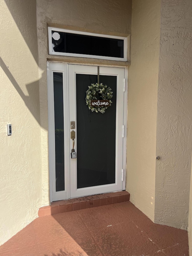 12362 Pleasant Green Way, Boynton Beach, FL 33437 - property entrance with stucco siding