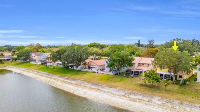 aerial view with a water view and a residential view