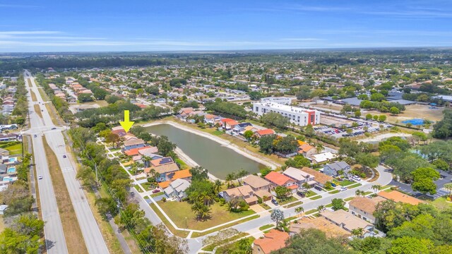 drone / aerial view with a water view