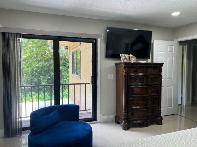 living area featuring baseboards