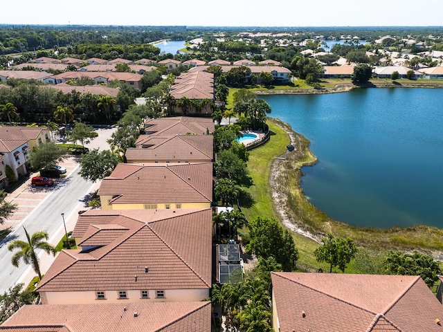 aerial view of residential area with a nearby body of water