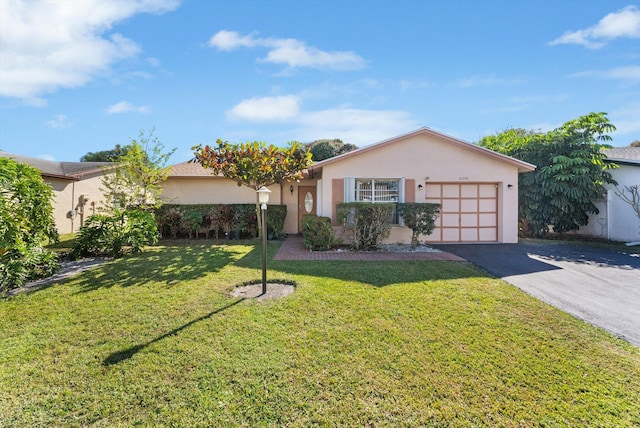 6292 Silver Moon Ln, Greenacres, FL 33463 - single story home featuring stucco siding, an attached garage, a front yard, and aphalt driveway