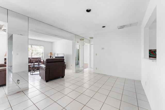 6292 Silver Moon Ln, Greenacres, FL 33463 - living area with light tile patterned floors and visible vents