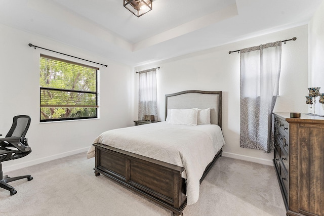 12968 Anthorne Ln, Boynton Beach, FL 33436 - bedroom featuring baseboards, a tray ceiling, and light carpet