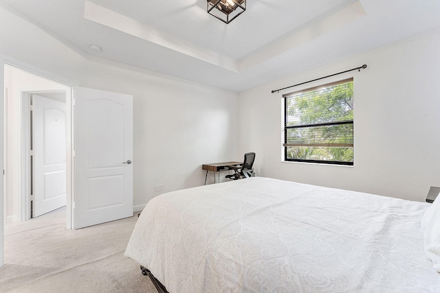 12968 Anthorne Ln, Boynton Beach, FL 33436 - carpeted bedroom with a tray ceiling