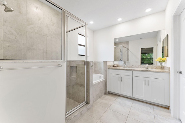 12968 Anthorne Ln, Boynton Beach, FL 33436 - bathroom with a bath, a sink, tile patterned flooring, and a stall shower