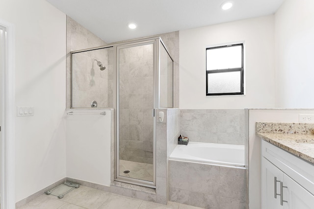 12968 Anthorne Ln, Boynton Beach, FL 33436 - bathroom featuring tile patterned floors, a shower stall, recessed lighting, and a garden tub