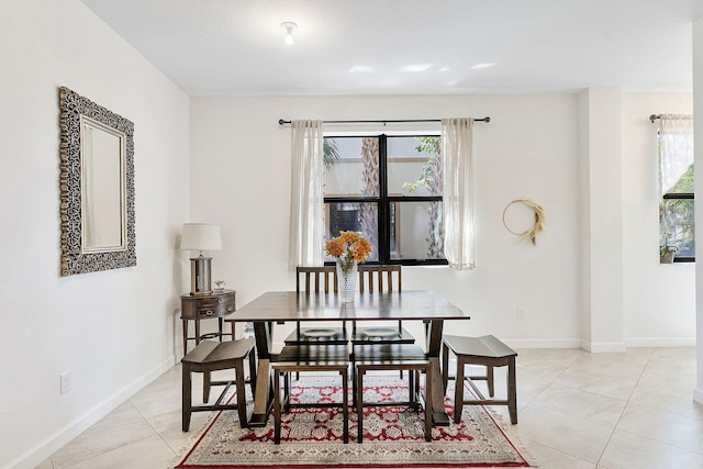 12968 Anthorne Ln, Boynton Beach, FL 33436 - dining area with baseboards and light tile patterned floors
