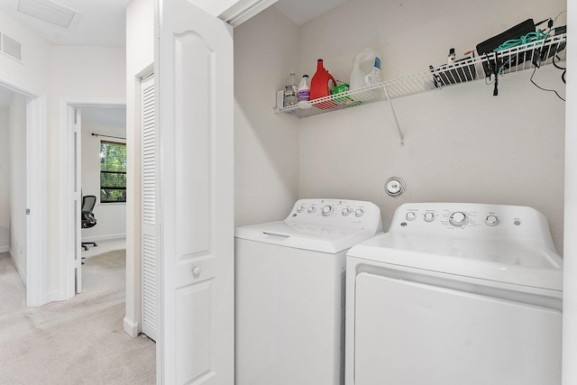 12968 Anthorne Ln, Boynton Beach, FL 33436 - laundry area featuring laundry area, visible vents, light carpet, baseboards, and washing machine and clothes dryer