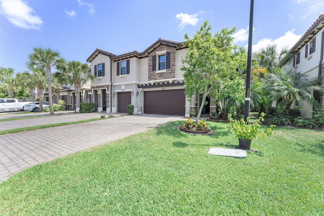 12968 Anthorne Ln, Boynton Beach, FL 33436 - mediterranean / spanish home featuring stone siding, a garage, stucco siding, decorative driveway, and a tiled roof