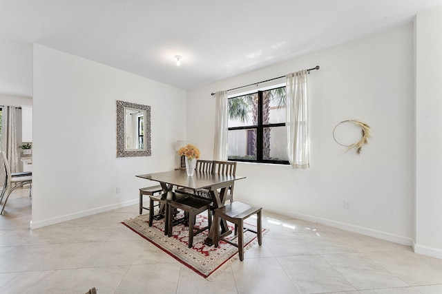 12968 Anthorne Ln, Boynton Beach, FL 33436 - dining area with light tile patterned floors and baseboards