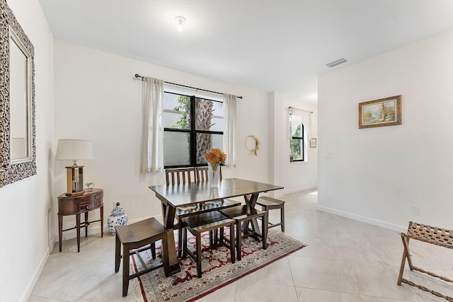12968 Anthorne Ln, Boynton Beach, FL 33436 - dining area with visible vents, baseboards, and light tile patterned floors